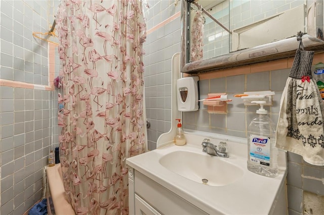 171 Hale Ave, Brooklyn, NY 11208 - bathroom featuring tile walls, vanity, and shower / bath combo
