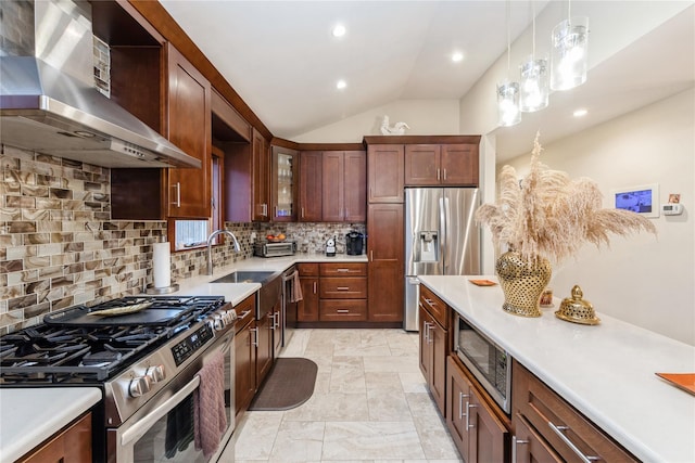 91-10 164th, Howard Beach, NY 11414 - kitchen featuring appliances with stainless steel finishes, wall chimney exhaust hood, a sink, light countertops, and decorative backsplash