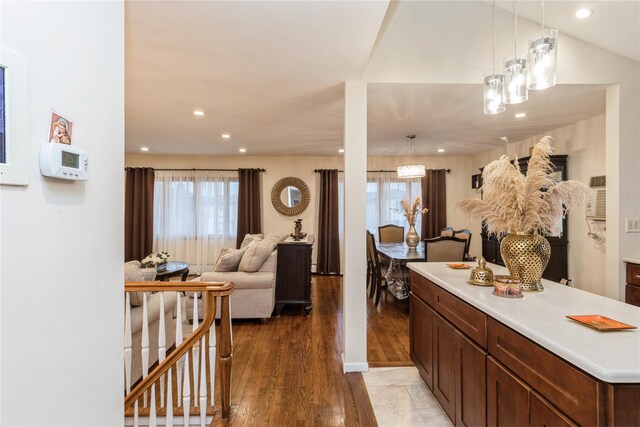 91-10 164th, Howard Beach, NY 11414 - kitchen with open floor plan, healthy amount of natural light, light wood finished floors, recessed lighting, and light countertops