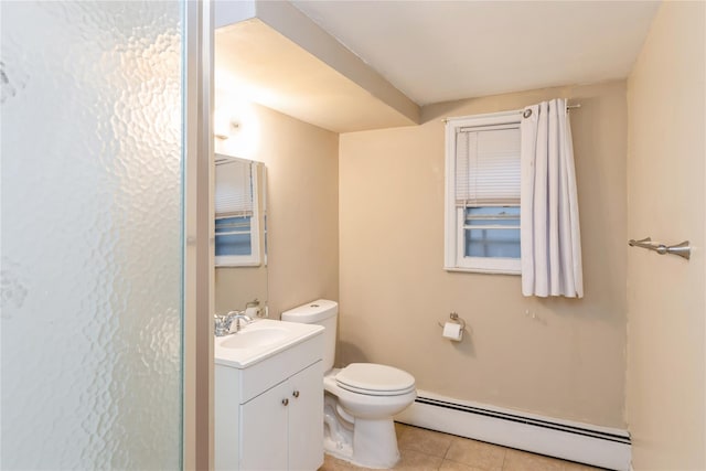 91-10 164th, Howard Beach, NY 11414 - bathroom with a baseboard heating unit, tile patterned floors, toilet, and vanity