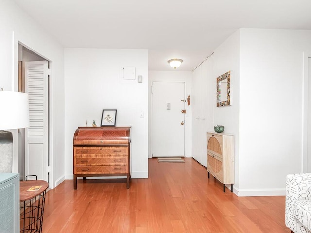555 Kappock St Unit 18C, Bronx, NY 10463 - foyer entrance featuring light wood-style flooring and baseboards