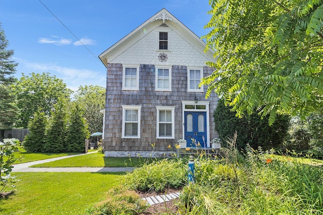30 Railroad Ave, Center Moriches, NY 11934 - victorian house featuring a front lawn