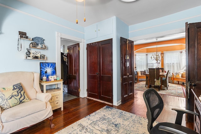 30 Railroad Ave, Center Moriches, NY 11934 - office featuring dark wood-style flooring and a chandelier