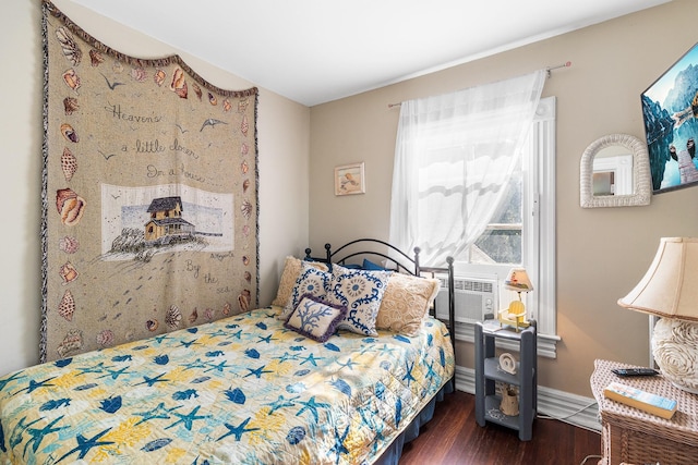 30 Railroad Ave, Center Moriches, NY 11934 - bedroom featuring dark wood finished floors and baseboards