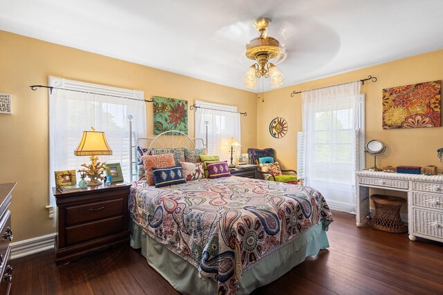 30 Railroad Ave, Center Moriches, NY 11934 - bedroom featuring dark wood finished floors