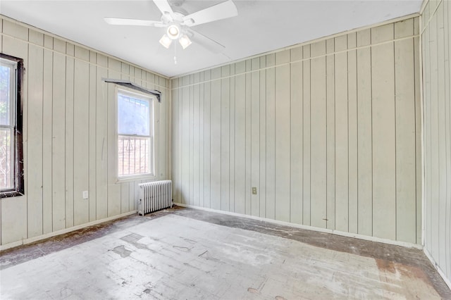 8 Van Siclen Ave, Brooklyn, NY 11207 - empty room featuring radiator heating unit, plenty of natural light, a ceiling fan, and baseboards