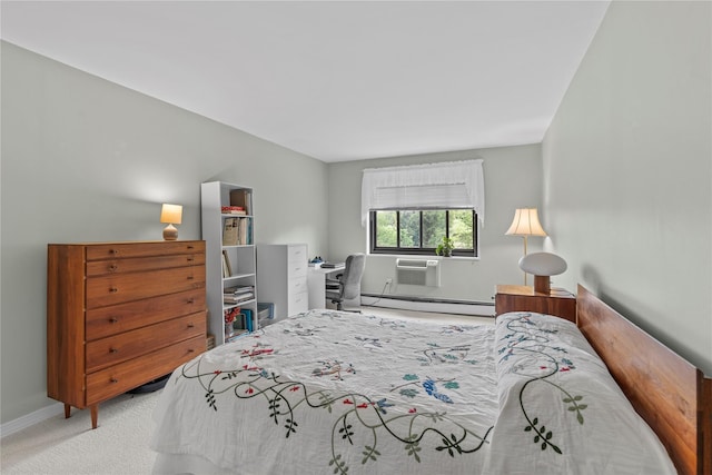carpeted bedroom with a baseboard heating unit, baseboards, and an AC wall unit