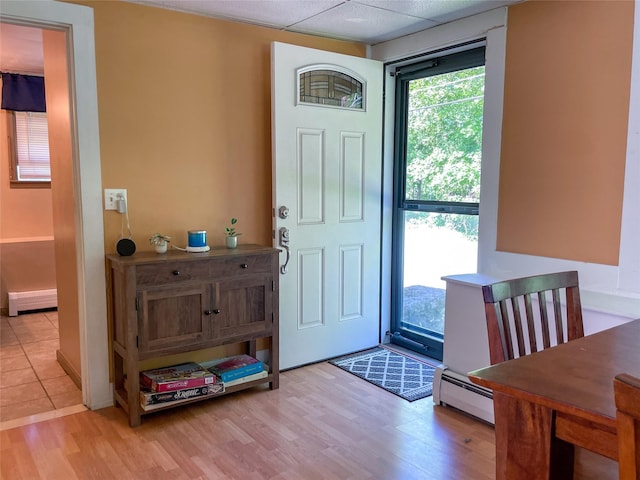 40 Cream St, Poughkeepsie, NY 12601 - entryway with a baseboard radiator and light wood-style flooring
