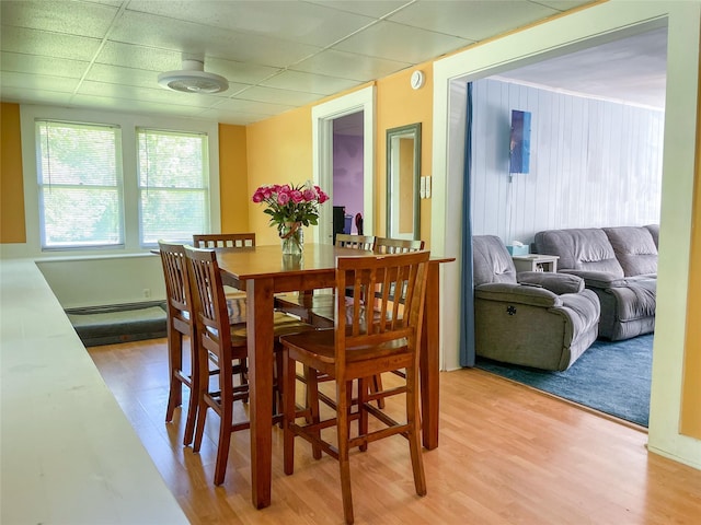40 Cream St, Poughkeepsie, NY 12601 - dining area featuring light wood finished floors and a drop ceiling