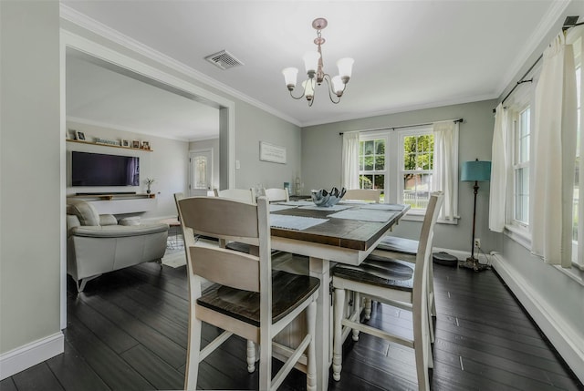 935 Harrison Dr, Centerport, NY 11721 - dining space with a chandelier, dark wood-style floors, ornamental molding, and baseboards