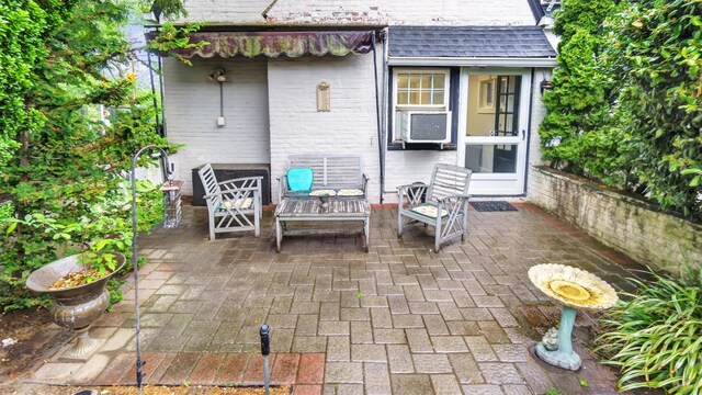 19 Barstow Rd Unit G, Great Neck, NY 11021 - view of patio / terrace featuring an outdoor living space