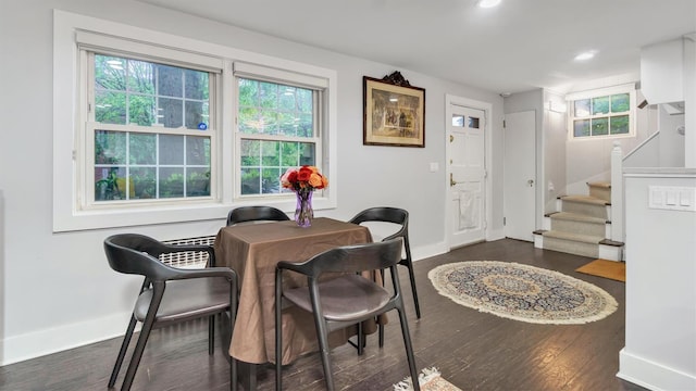 19 Barstow Rd Unit G, Great Neck, NY 11021 - dining area with dark wood finished floors, stairway, baseboards, and recessed lighting