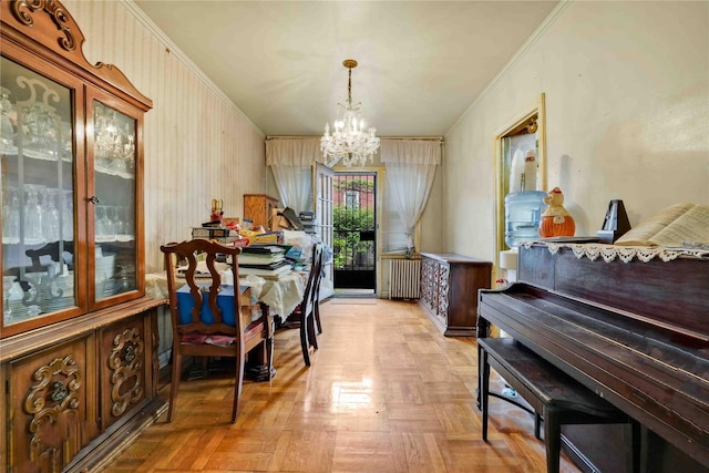 dining room featuring radiator, a chandelier, and ornamental molding