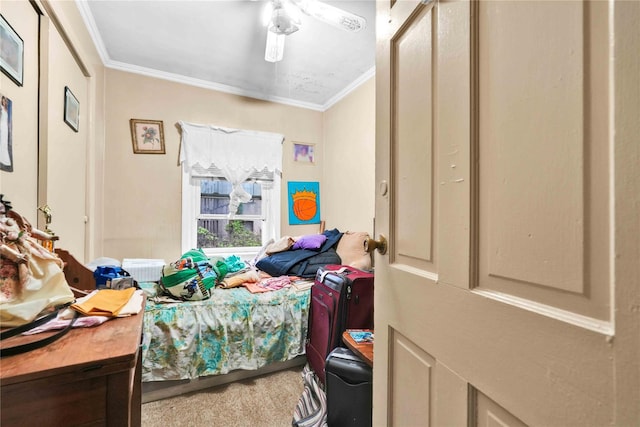 bedroom featuring ornamental molding and a ceiling fan