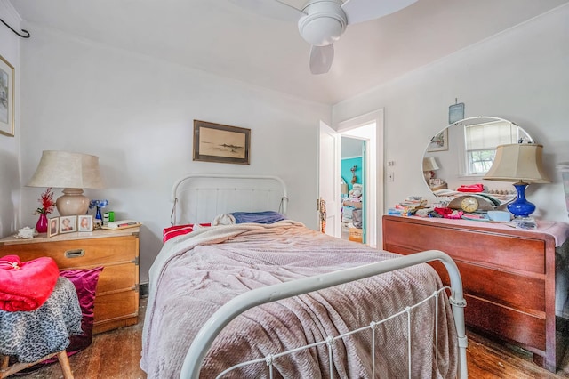 bedroom featuring wood finished floors and ceiling fan