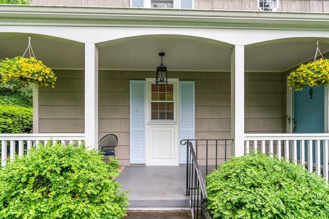 doorway to property with a porch