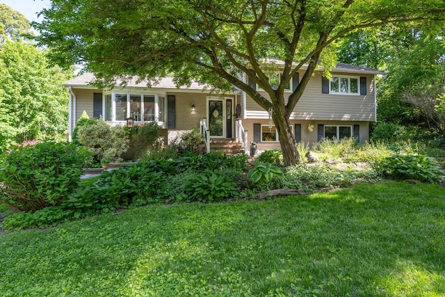 10 Falcon Pl, Huntington, NY 11743 - tri-level home with a front lawn