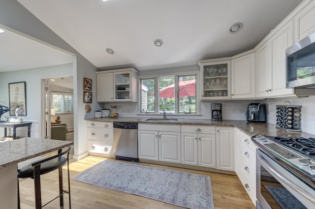 10 Falcon Pl, Huntington, NY 11743 - kitchen featuring stainless steel appliances, plenty of natural light, a sink, light wood-style floors, and recessed lighting