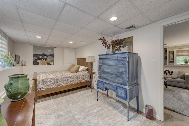 10 Falcon Pl, Huntington, NY 11743 - carpeted bedroom featuring tile patterned floors, a drop ceiling, baseboards, multiple windows, and recessed lighting