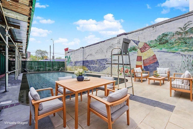 2265 Gerritsen Ave Unit 5C, Brooklyn, NY 11229 - fenced backyard featuring a patio and outdoor lounge area