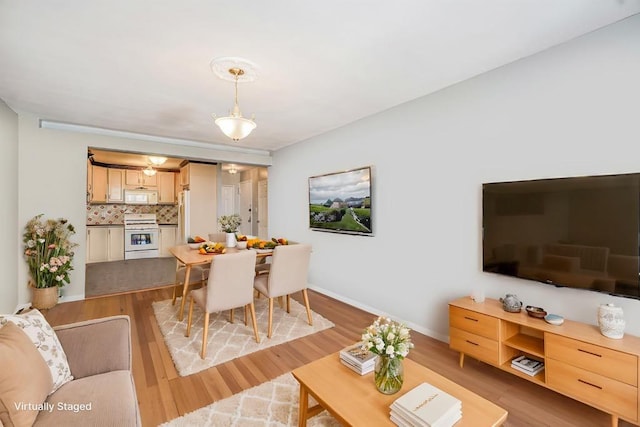 2265 Gerritsen Ave Unit 5C, Brooklyn, NY 11229 - living room with light wood-style flooring and baseboards