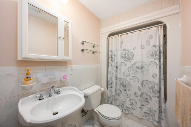 17 Stonegate Dr, Hyde Park, NY 12538 - full bath with a sink, tile walls, toilet, a wainscoted wall, and a shower with shower curtain