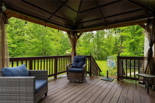 17 Stonegate Dr, Hyde Park, NY 12538 - wooden deck featuring a lawn, a gazebo, and a forest view