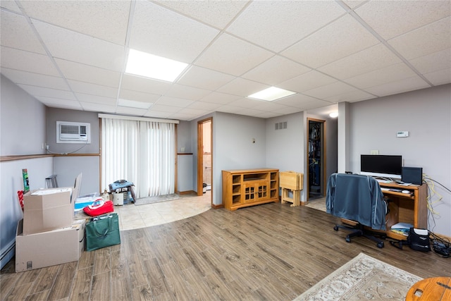 3 Sodano Rd, Hopewell Junction, NY 12533 - office featuring wood finished floors, a paneled ceiling, and a wall mounted air conditioner