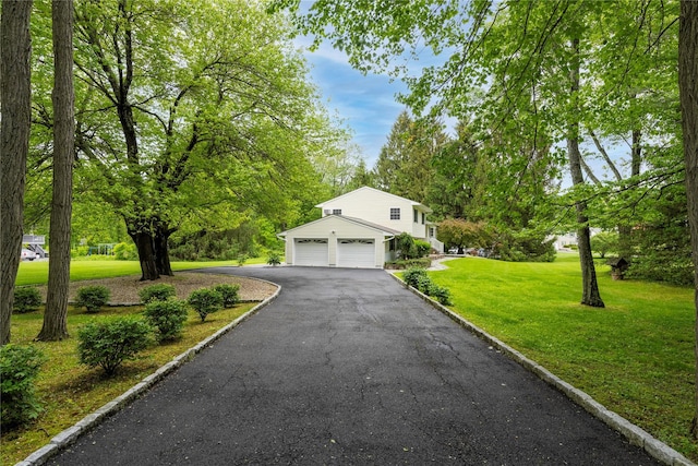 3 Sodano Rd, Hopewell Junction, NY 12533 - view of front of home with a front yard, driveway, and a garage