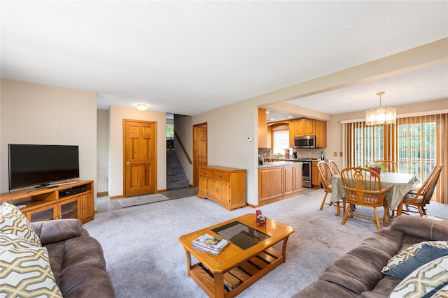 3 Sodano Rd, Hopewell Junction, NY 12533 - living area featuring stairway, plenty of natural light, and light carpet