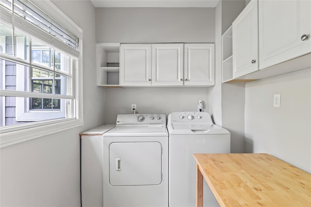 85 Shore Rd, Amityville, NY 11701 - laundry room with cabinet space and washer and dryer