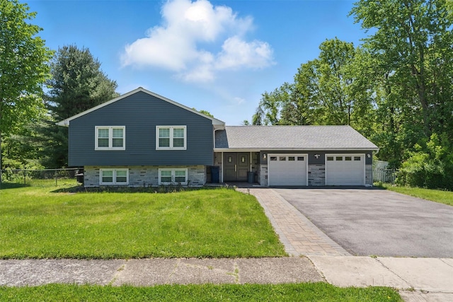 8 Clinton Ct, Monroe, NY 10950 - tri-level home featuring an attached garage, asphalt driveway, and stone siding