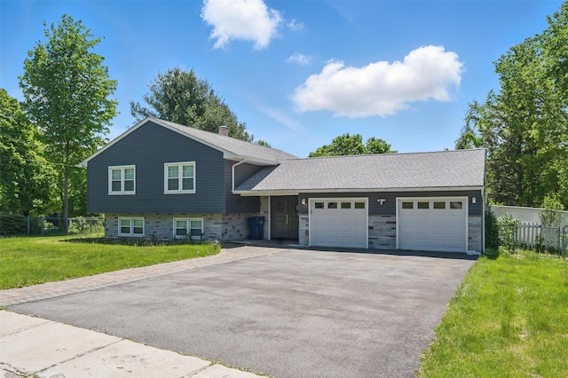 8 Clinton Ct, Monroe, NY 10950 - split level home with driveway, a garage, stone siding, roof with shingles, and a chimney
