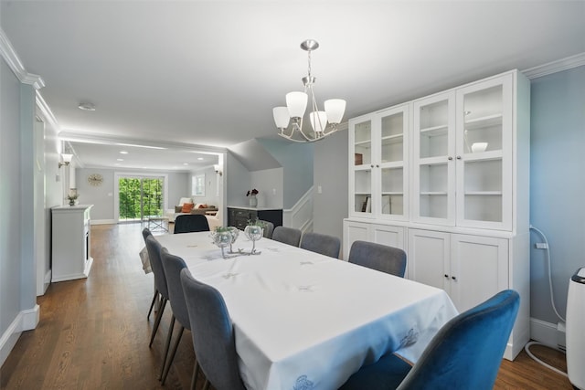 8 Clinton Ct, Monroe, NY 10950 - dining room with a chandelier, dark wood finished floors, baseboards, and crown molding