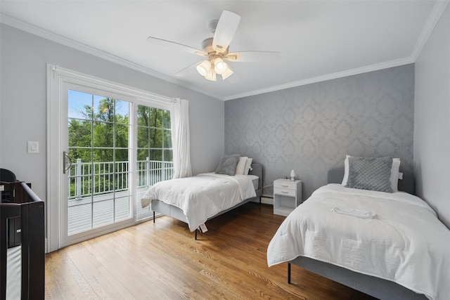 8 Clinton Ct, Monroe, NY 10950 - bedroom with access to exterior, wood finished floors, crown molding, ceiling fan, and a baseboard heating unit