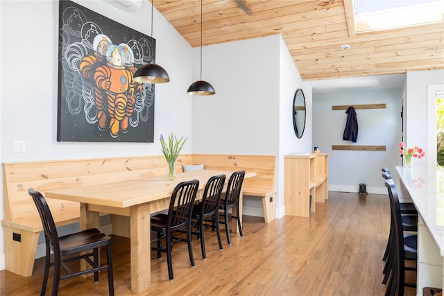2865 S Harbor Rd, Southold, NY 11971 - dining room with wooden ceiling, wood finished floors, lofted ceiling, and baseboards
