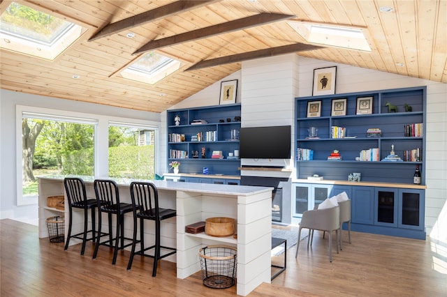 2865 S Harbor Rd, Southold, NY 11971 - kitchen with a skylight, open shelves, and wood ceiling