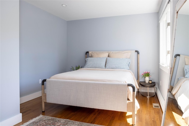 2865 S Harbor Rd, Southold, NY 11971 - bedroom featuring light wood finished floors and baseboards