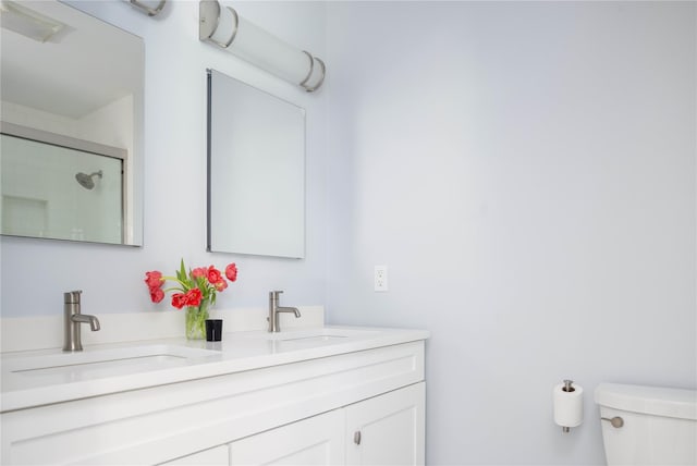 2865 S Harbor Rd, Southold, NY 11971 - bathroom featuring toilet, an enclosed shower, and double vanity