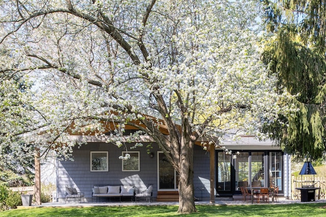 2865 S Harbor Rd, Southold, NY 11971 - back of house featuring a patio, an outdoor hangout area, and a lawn