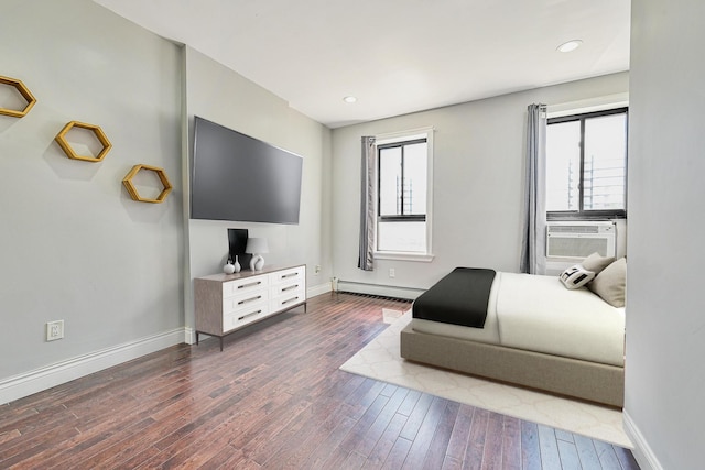 5130 35th St, Long Island City, NY 11101 - bedroom featuring a baseboard radiator, cooling unit, wood-type flooring, baseboards, and recessed lighting
