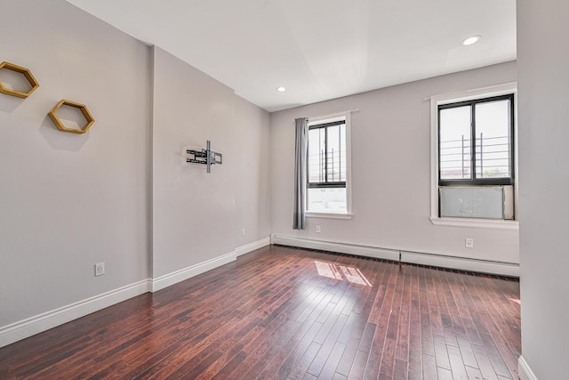 5130 35th St, Long Island City, NY 11101 - unfurnished room featuring baseboard heating, healthy amount of natural light, wood-type flooring, baseboards, and recessed lighting