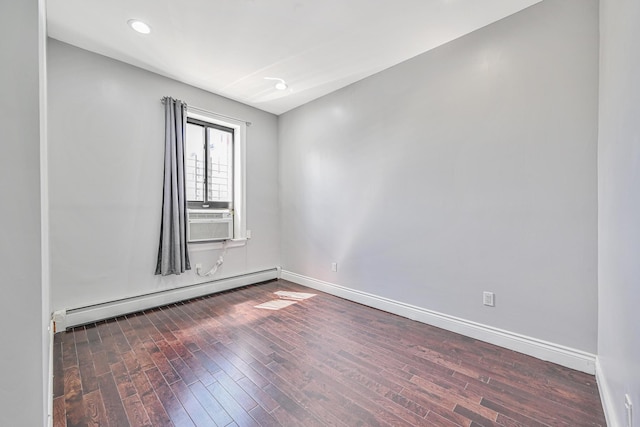 5130 35th St, Long Island City, NY 11101 - spare room with a baseboard heating unit, wood finished floors, cooling unit, and baseboards