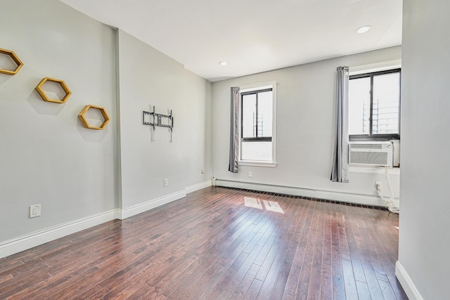5130 35th St, Long Island City, NY 11101 - empty room with a baseboard heating unit, cooling unit, wood-type flooring, baseboards, and recessed lighting
