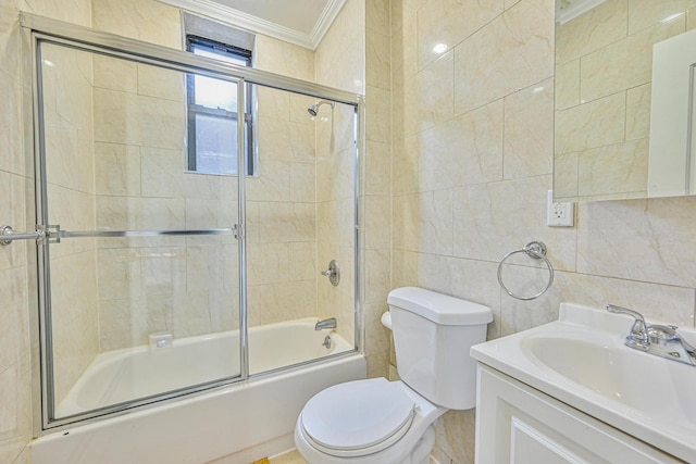 5130 35th St, Long Island City, NY 11101 - bathroom with ornamental molding, toilet, enclosed tub / shower combo, vanity, and tile walls