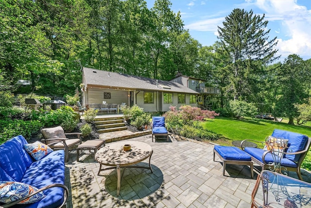 42 Raspberry Ln, Carmel, NY 10512 - view of patio / terrace featuring an outdoor living space and view of wooded area