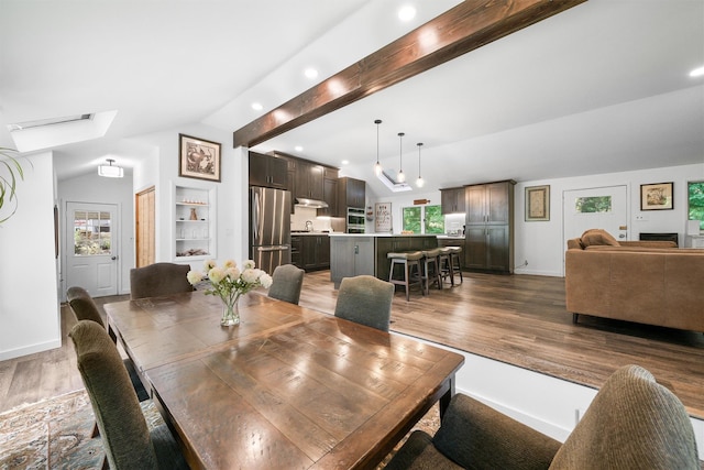 42 Raspberry Ln, Carmel, NY 10512 - dining space with wood finished floors, healthy amount of natural light, recessed lighting, baseboards, and built in features