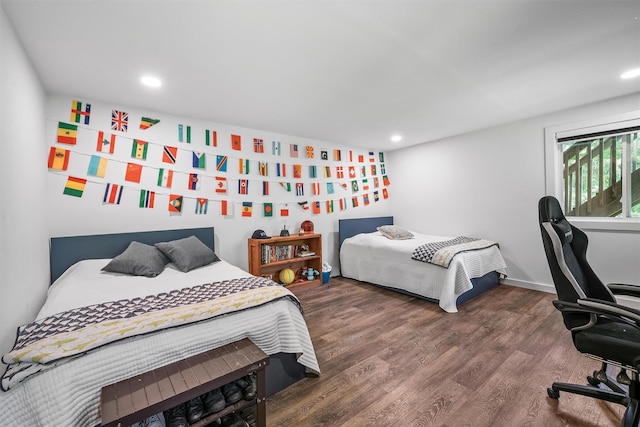 42 Raspberry Ln, Carmel, NY 10512 - bedroom featuring recessed lighting, wood finished floors, and an office area