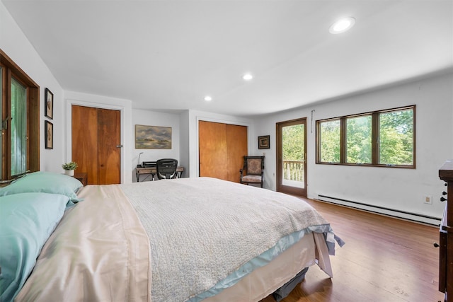 42 Raspberry Ln, Carmel, NY 10512 - bedroom featuring a baseboard heating unit, recessed lighting, access to outside, and wood finished floors