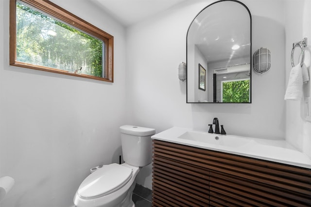 42 Raspberry Ln, Carmel, NY 10512 - half bath featuring vanity, plenty of natural light, and toilet